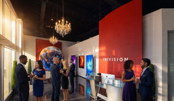 Professionals socializing with cocktails at an event venue lounge