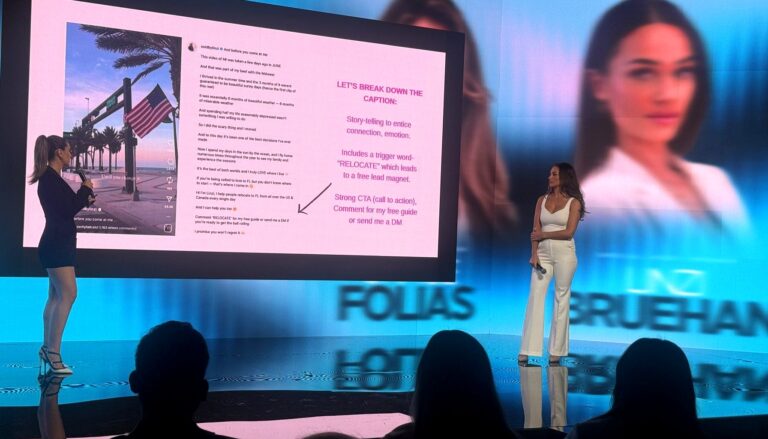 # Image Description This image shows a digital marketing presentation or conference talk where a speaker in a white outfit…