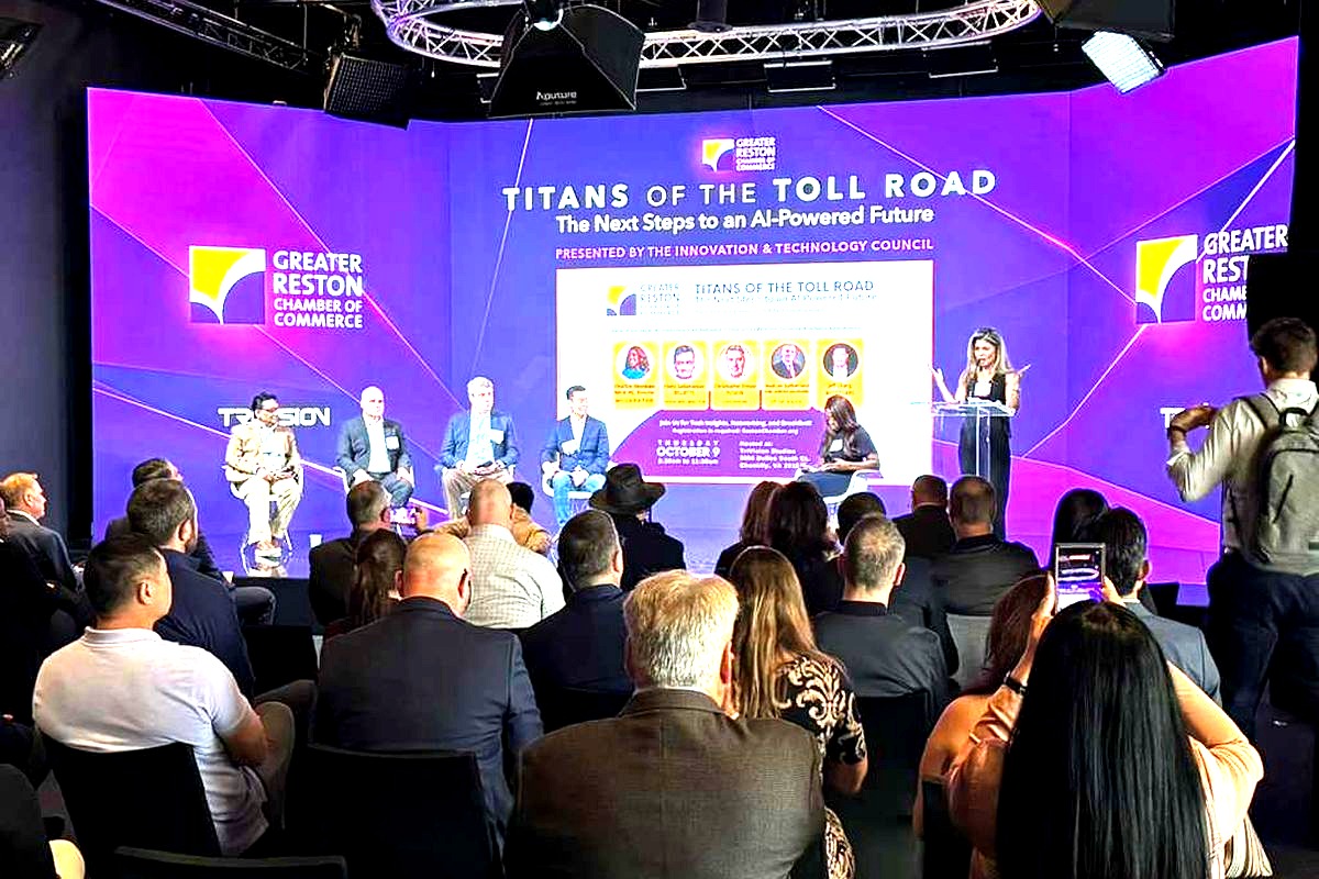 A professional conference panel discussion titled 