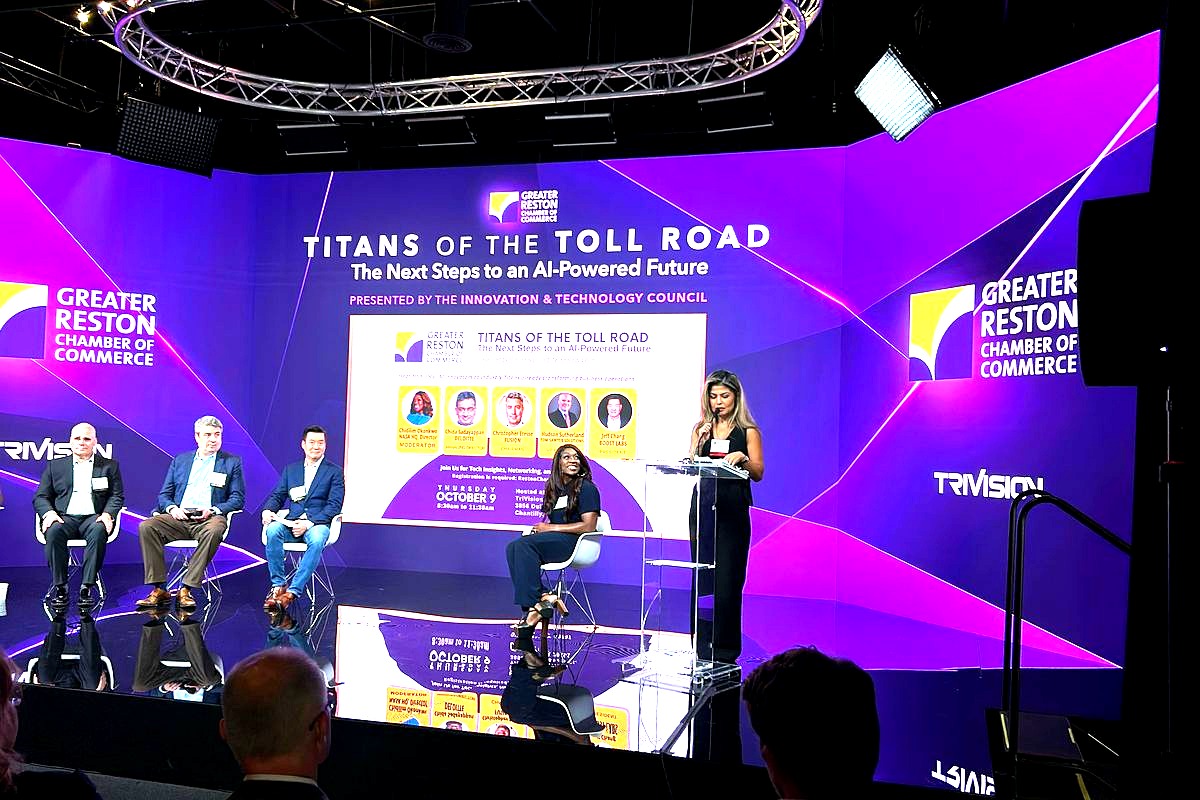 A professional conference panel presentation titled 