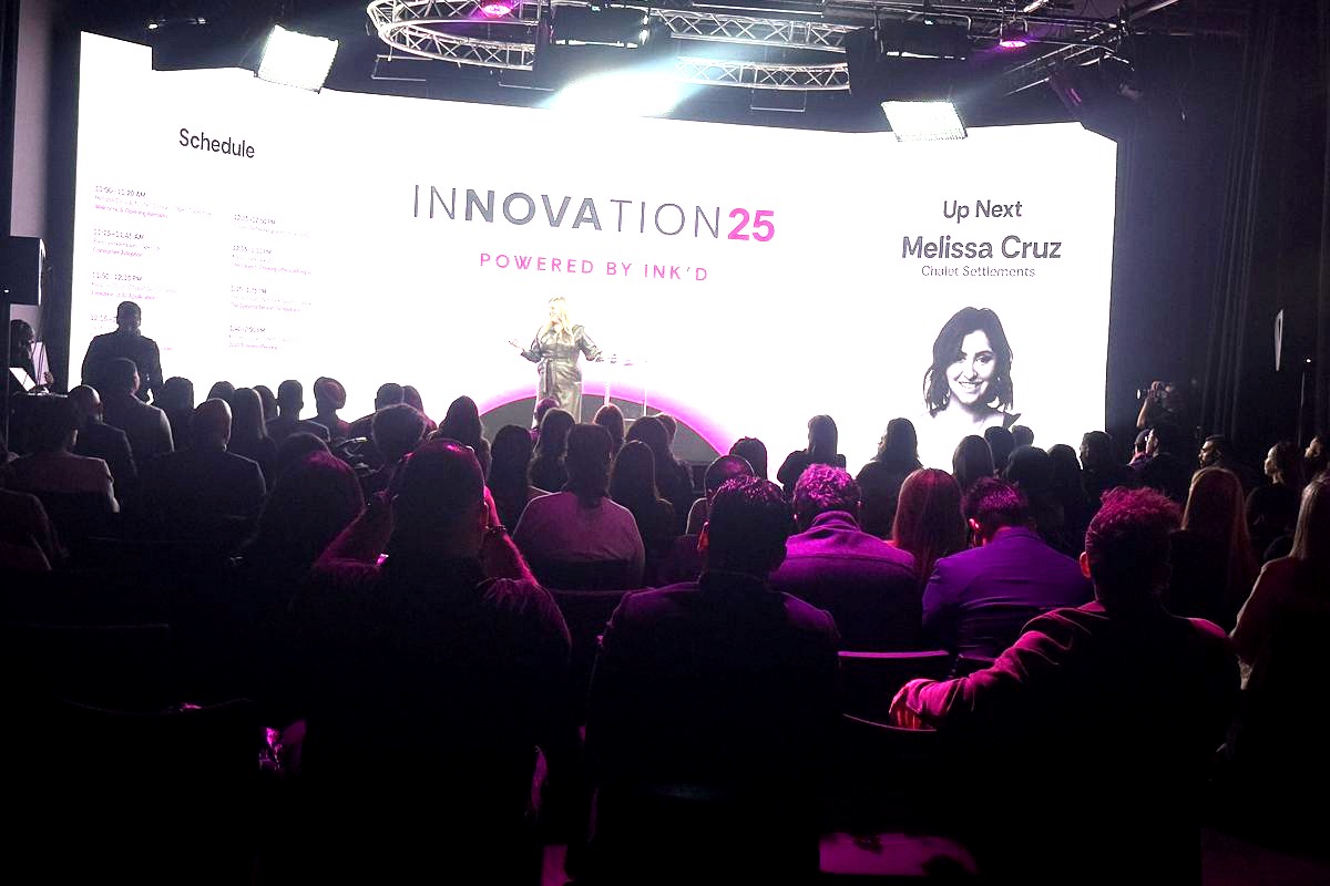 This image captures a speaker presenting at the 